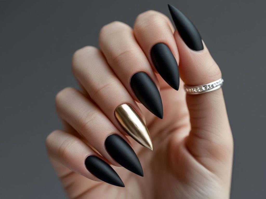 Metallic accent nail idea with gold polish for a 2025 chic manicure
